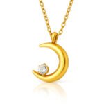 Gold crescent moon necklace with cubic zirconia pendant on chain