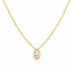 Gold necklace with teardrop cubic zirconia pendant on chain