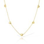 Gold stainless steel necklace with multiple heart-shaped accents on a delicate chain