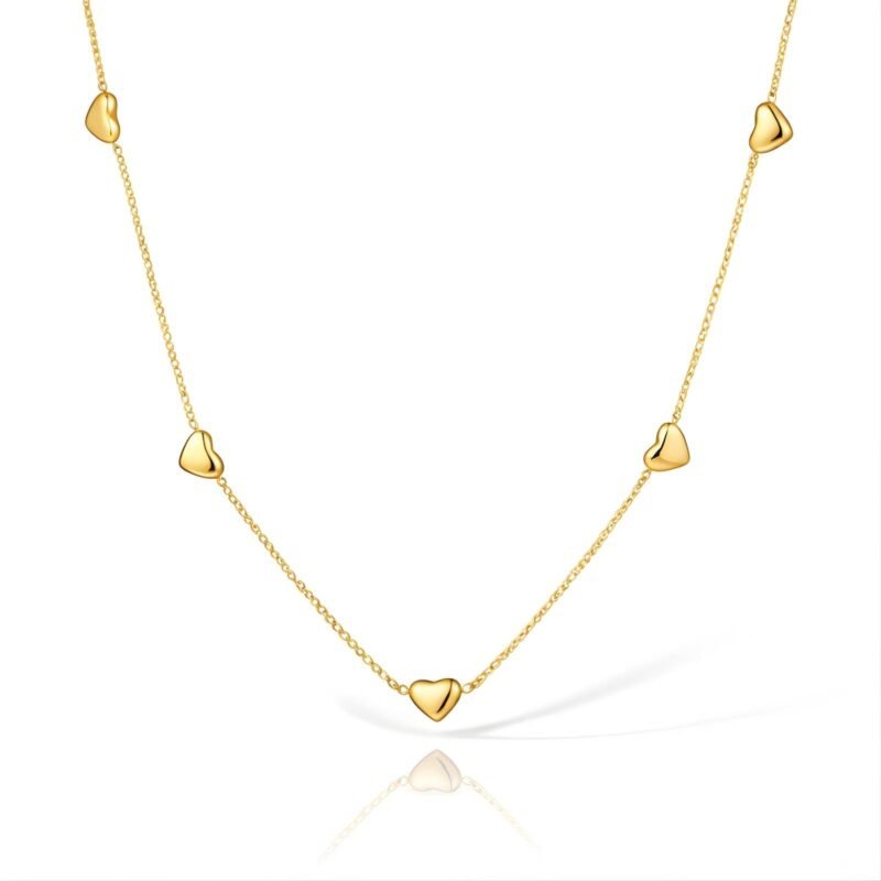 Gold stainless steel necklace with multiple heart-shaped accents on a delicate chain