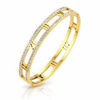 Gold cuff bracelet with Roman numeral cutouts and cubic zirconia accents