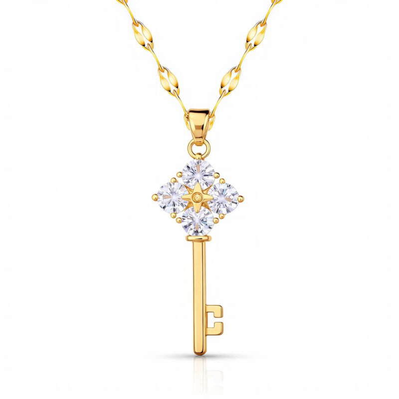 Gold key pendant necklace with cubic zirconia and star detail