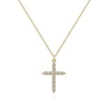 Gold cross pendant necklace with cubic zirconia on a fine chain