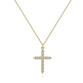 Gold cross pendant necklace with cubic zirconia on a fine chain