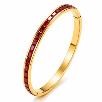 18K gold bangle with ruby red stones