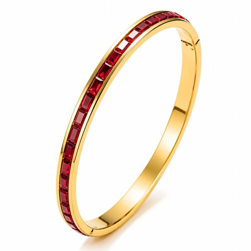 18K gold bangle with ruby red stones