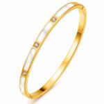 18K gold bangle bracelet with mother of pearl inlays and sparkling stones