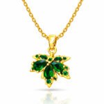 18K gold necklace with green gemstone leaf pendant on a gold chain
