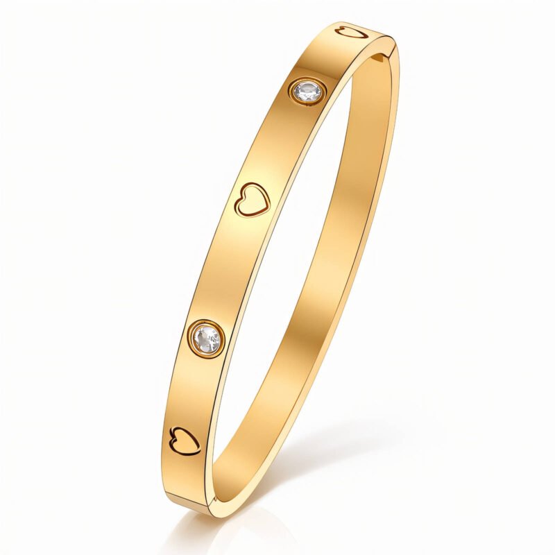 18K gold bangle bracelet with heart motifs and crystal accents